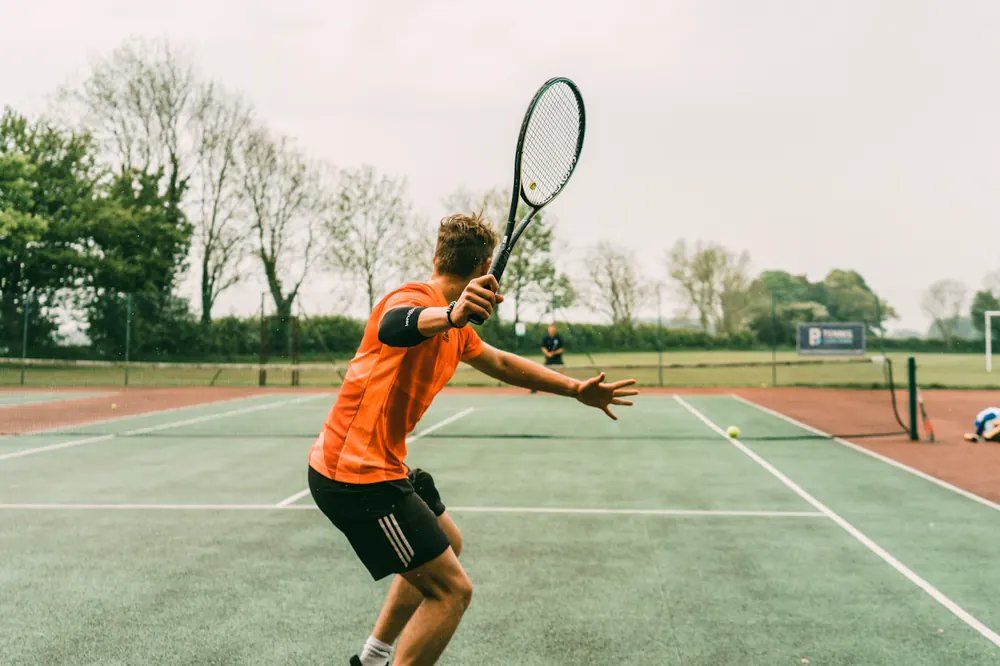 Clay court surface with fine dust and line chalk